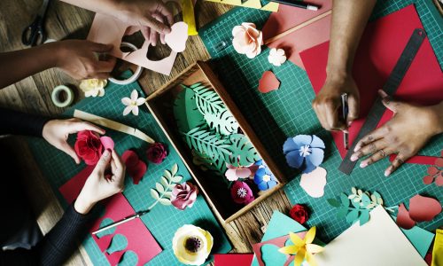 People Making Paper Flowers Craft Art Work Handicraft